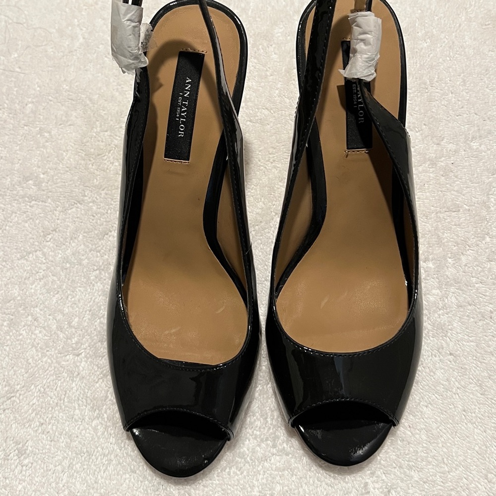 Ann Taylor navy blue patent leather spike heels.  NWOT, no box.